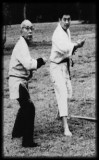 Soke Takamatsu teaching Soke Hatsumi how to throw shuriken